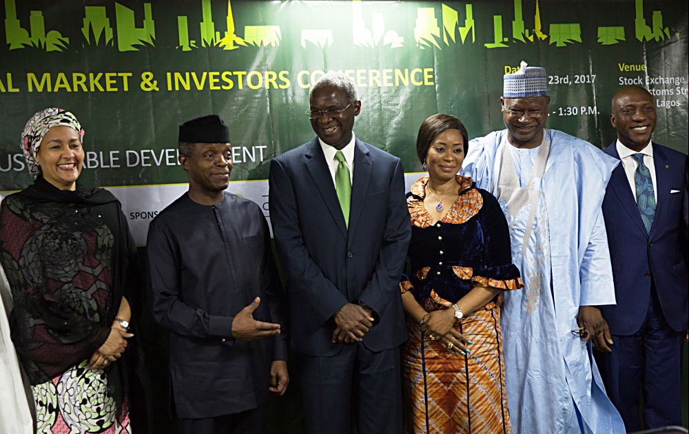 Acting President Prof Yemi Osinbajo SAN2nd leftHon Minister of Power Works  Housing Mr Babatunde FasholaSAN3rd left Minister of Environment Mrs Amina MohammedleftMinister of State Environment Mallam Ibrahim Jibril 2nd rightFirst Lady of Ogun State Mrs Olufunso Amosun and CEO The Nigerian Stock Exchange Mr Oscar Onyemaright in a group photograph shortly after the Opening Session of the Green Bonds Capital Market  Investors Conference organized by the Federal Ministry of Environment with the theme Green Bonds Investing in Nigerias Sustainable Development at the Stock Exchange House Marina Lagos on Thursday 23rd February 2017