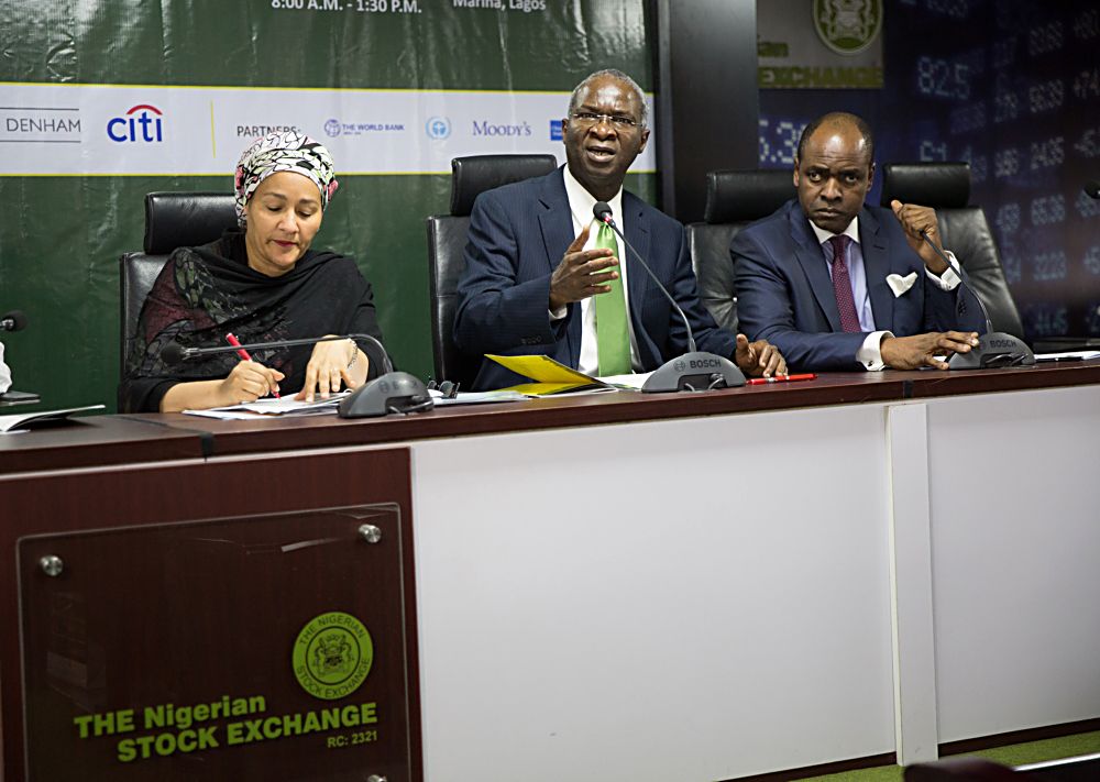 Hon Minister of Power Works  Housing Mr Babatunde FasholaSANmiddle Minister of Environment Mrs Amina Mohammedleftand CEO Chapel Hill Denham Mr Bolaji Balogun right duringthe Opening Session of the Green Bonds Capital Market  Investors Conference organized by the Federal Ministry of Environment with the theme Green Bonds Investing in Nigerias Sustainable Development at the Stock Exchange House Marina Lagos on Thursday 23rd February 2017