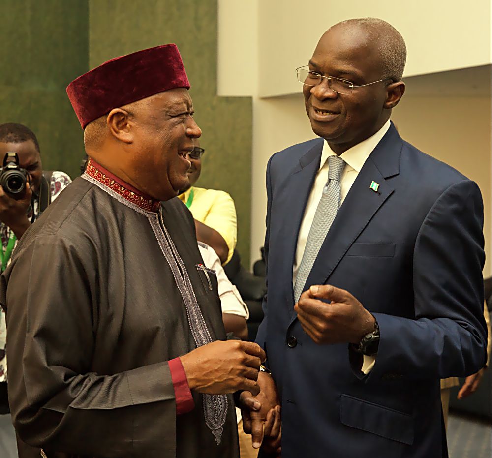 Hon Minister of Power Works  Housing Mr Babatunde Fashola SANright and Chairman Senate Committee on Housing Sen Barnabas Gemadeleft shortly before Opening Ceremony of the 11th Abuja Housing Show on the theme Solving Nigerias Housing Challenge through Innovative Finance and Infrastructure Solutions organized by Fesadeb Media Group at the International  Conference Centre Abuja on Monday 17th July 2017