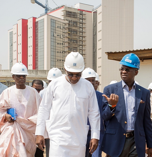 Hon Minister of Power Works  Housing Mr Babatunde FasholaSANrightPermanent Secretary Works  Housing Mr Muhammad Bukar left andPrincipal Partner Ericon Bello  Associates Arc Ibrahim Murtalamiddleduring the Ministers inspection of the EFCCs New Office Building at the Airport Road Jabi Abuja on Monday 22nd January 2018