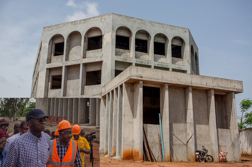 A viewof the ongoing construction work onMausoleum Library complexin Anambra StateINSETHon Minister of Power Works  Housing Mr Babatunde Fashola SANleft and Project Manager Bouygues Nigeria Limited Engr John Amehduring the Hon Ministersinspection tour of the ongoing construction work ontheMausoleum  Library Complexin Honour of Late Rt Hon Dr Nnamdi Azikiwe in Onitsha Anambra State on Day Three of the inspection tour of Federal Government Infrastructure Projects in the South East Zone of the country on Thursday 19th May 2018