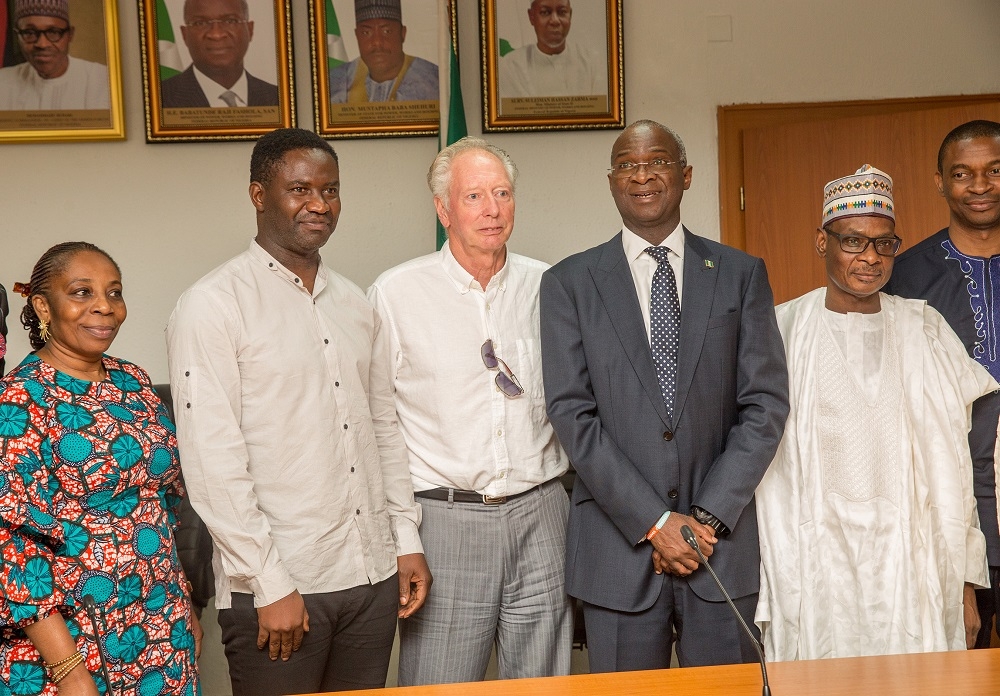 HonMinister of Power Works  Housing Mr Babatunde Fashola SAN 3rd right Permanent Secretary Works  HousingMr Mohammed Bukar2nd right Director HumanResource Mrs Morayo Alimi leftformerAssistant Technical Adviser of the Super Eagles Bonfrere Jo3rd left and former Super Eagles player Benedict Akwuegbu 2nd leftin a group photograph shortlyafter thehanding over of the keys of the Federal Government allocated House to the Coach in fulfillmentof Governments Pledge 24 years ago for Winning the 1994 African Cup of Nations at the Ministry of PowerWorks  Housing Headquarters Mabushi Abuja on Tuesday 5th June 2018