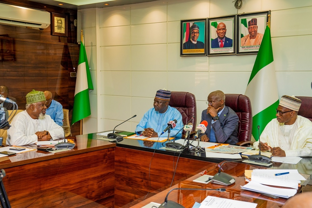 Hon  Minister of Works   Housing  Mr Babatunde Fashola SAN 2nd right   Minister of State in the Ministry  Engr  Abubakar Aliyu  2nd left   Permanent Secretary  Works   Housing  Mr  Mohammed Bukar right  and Chairman  Nigeria National Building Code Advisory Committee  Arch  Mohammed Jimoh Faworaja  left  during a courtesy visit by the   Committee at the Ministry of Works   Housing  Headquarters on Thursday  3rd October 2019