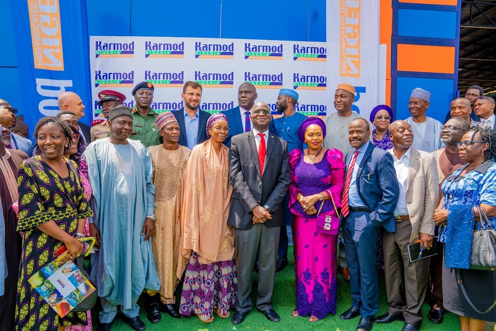 Hon  Minister of Works   Housing  Mr Babatunde Fashola SAN 5th left  CEO  Karmod Nigeria Limited  Mr Hakeem Shagaya 5th left  2nd row   renowned entrepreneur Alhaja Bola Shagaya 5th right  and others in a group photograph shortly after  the unveiling of prefabricated assembly and installation building facility of Karmod Nigeria Limited at Plot 3075  along Kubwa Expressway  Abuja on Tuesday 15th October 2019