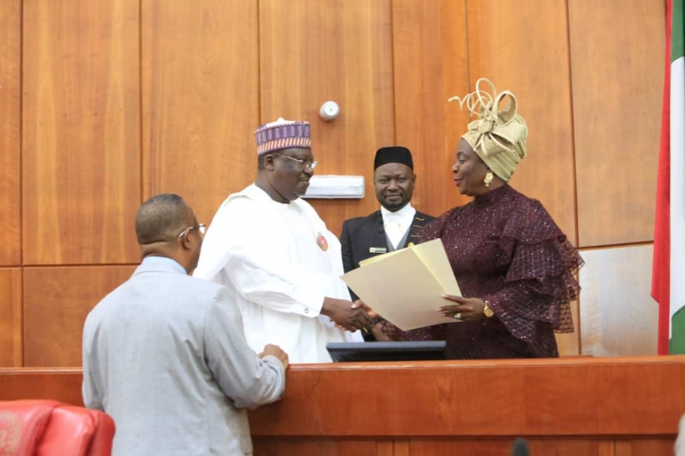 President of the Senate  Ahmad Lawan  during the swearing in of the senator representing Ekiti South Senatorial District  Senator Biodun Olujimi  at the National Assembly on Thursday  November 14  2019