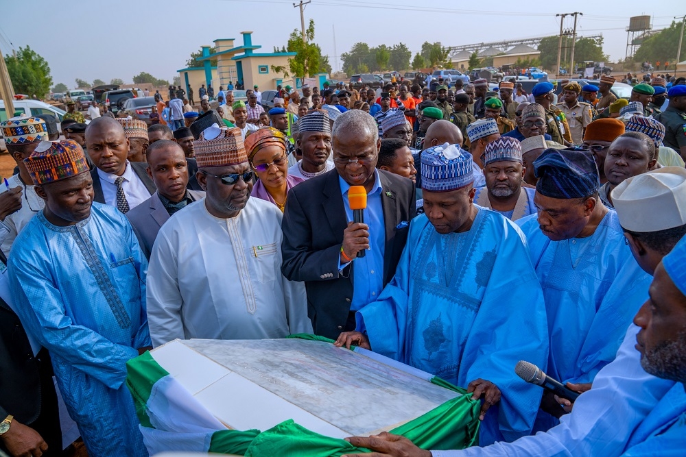 Hon  Minister of Works and Housing  Mr Babatunde Fashola SAN  middle   Minister of State in the Ministry  Engr  Abubukar Aliyu  2nd  left  Governor of Gombe State Alhaji Muhammadu Inuwa Yahaya  2nd  right    Chairman  Board of Directors FMBN  Dr  Adewale Adeeyo  right  and others  during the Commissioning of Gombe State Investment Housing Estate Under the Federal Mortgage Bank of Nigeria FMBN  Estate Development Loan  EDL  Window at the Project Site  along Dukku Road Gombe   Gombe State on Thursday  20th  February 2020