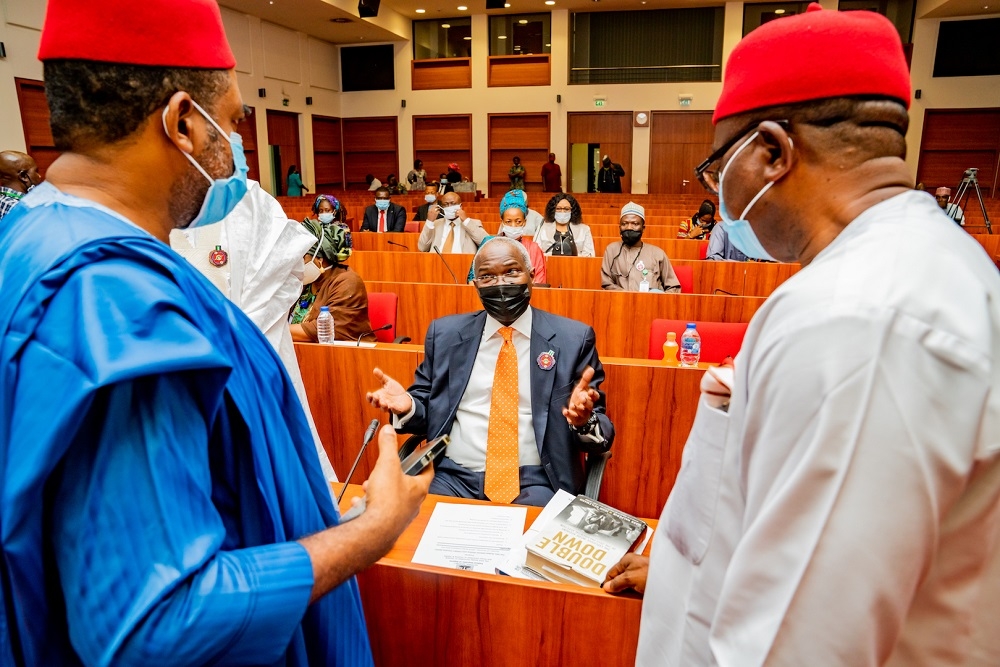 Hon. Minister of Works and Housing, Mr Babatunde Fashola, SAN (middle), member representing Ahiazu/Ezinihitte Mbaise, Federal Constituency, Imo State, Hon. Chinedu Emeka Martins (left) and member representing Ikwuano/Umuahia North /South Federal Constituency of Abia State, Hon. Samuel Onuigbo (right) shortly after a Joint Session of the Year 2021 Budget Defence hosted by the Senate and  House Committees on Housing at the National Assembly Complex, Abuja on Thursday, 12th November  2020