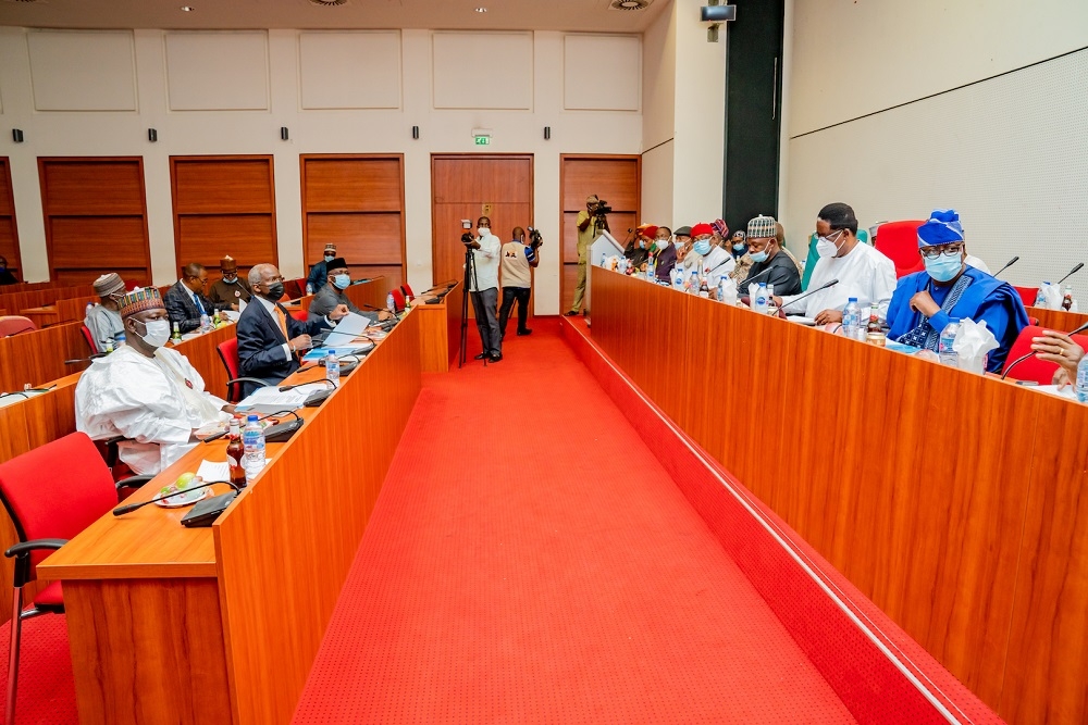 Hon. Minister of Works and Housing, Mr Babatunde Fashola, SAN (middle), Minister of State in the Ministry, Engr. Abubakar Aliyu (right), Permanent Secretary, Mr Ernest Afolabi Umakhihe (left) , Joint Committee Chairmen and other members during a Joint Session of the Year 2021 Budget Defence hosted by the Senate and  House Committees on Housing at the National Assembly Complex, Abuja on Thursday, 12th November  2020