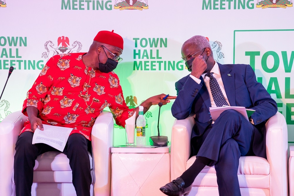 Hon. Minister of Works and Housing, Mr. Babatunde Fashola, SAN (right),and Hon.Minister of Transportation, Mr. Rotimi Amaechi (left) during the Town Hall Meeting on Protecting Public Infrastructure organized by the Federal Ministry of Information and Culture at the NAF Conference Centre, Abuja on Monday, 7th June 2021