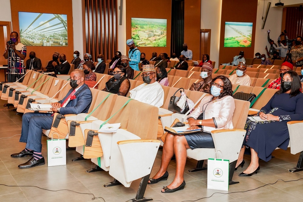 Managing Director/CEO, Federal Housing Authority(FHA), Senator Gbenga Ashafa(front row), other Board members and guests during the Inauguration of the Board of Directors of the Federal Housing Authority(FHA) at the Ministry of Works and Housing Headquarters, Mabushi, Abuja on Thursday 8th July 2021. 