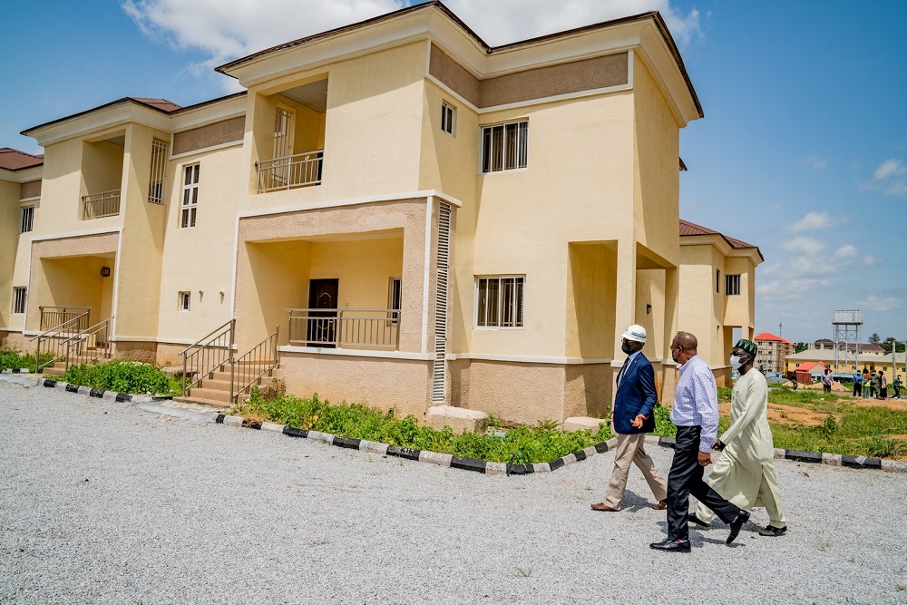 Hon. Minister of Works and Housing, Mr Babatunde Fashola, SAN (left),Permanent Secretary in the Ministry, Mr. Babangida Hussaini (middle), and Managing Director/CEO, Federal Housing Authority(FHA), Senator Gbenga Ashafa(right) during an inspection tour of the 764-Units Federal Housing Authority Residential Layouts (Abuja Mass Housing Scheme )  in Zuba, Abuja, FCT on Tuesday, 31st  August 2021.  