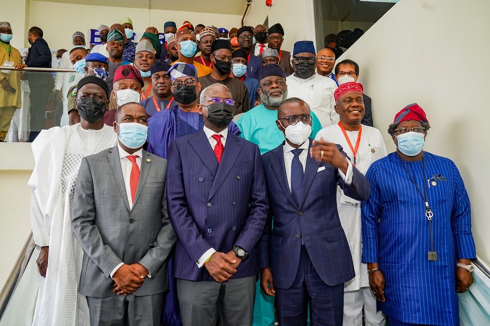 Hon. Minister of Works and Housing, Mr Babatunde Fashola, SAN (middle), Governor of Lagos State, Mr. Babajide Sanwoolu(2nd right), Deputy Governor of Lagos State, Dr. Femi Hamzat (2nd left), Permanent Secretary in the Ministry in the Ministry of Works and Housing, Mr. Babangida Hussaini(left; second row), Managing Director/CEO, Federal Housing Authority, Senator Gbenga Ashafa (2nd left; second row) , Hon. Commissioner for Housing, Lagos State, Hon. Moruf Akinderu-Fatai (right;second row) and other Commissioners in charge of Housing from across the country in a group photograph shortly after the Opening Session of the 10th Meeting of the National Council on Lands, Housing and Urban Development, with the theme,&quot; Housing Development as a Catalyst for Job Creation, Social Inclusion and Economic Development,&quot; at the D&#039;Podium International Event Centre in Ikeja, Lagos on Thursday, 21st October, 2021. 