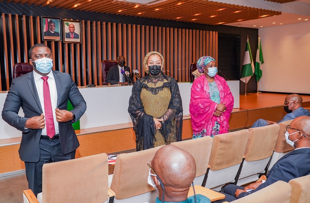 Executive Director, Project Implementation, Engr. Chinonso Sam Omoke (left),Executive Director, Housing Finance and Accounts, Mrs Adama kure(left) and Executive Director, Estate Services, Mrs Hauwa Babakobi Mohammed (right) during the inauguration of the three new Executive Directors of the Federal Housing Authority (FHA) at the Ministry of Works and Housing Headquarters, Mabushi, Abuja on Tuesday, 16th November 2021 