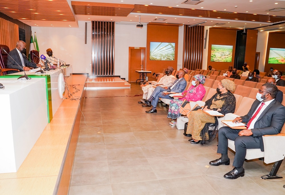 Hon. Minister of Works and Housing, Mr Babatunde Fashola,SAN (left; front row), Permanent Secretary in the Ministry of Works and Housing, Mr. Babangida Hussaini (right; front row), Managing Director/CEO, Federal Housing Authority(FHA), Senator Olugbenga Ashafa (2nd left), Chairman, Board of the Federal Housing Authority (FHA), Senator Lawal Shuaibu (left), Executive Director, Project Implementation, Engr. Chinonso Sam Omoke (right), Executive Director, Housing Finance and Accounts, Mrs Adama Kure (3rd right) and  Executive Director, Estate Services, Mrs Hauwa Babakobi Mohammed (2nd right) during the inauguration of the three new Executive Directors of the Federal Housing Authority (FHA) at the Ministry of Works and Housing Headquarters, Mabushi, Abuja on Tuesday, 16th November 2021   