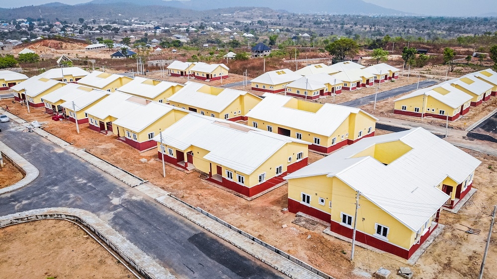 A view of the Housing Projects under the National Housing Programme (NHP) Phase 1 in Kogi State during its commissioning by  representative of President Muhammadu Buhari and Senior Special Assistant, Council Services, FCTA, Hon. Muhammad Saba, Senator reprepresenting Kogi East Senatorial District, Senator Isah Jibrin, representative of the Hon.Minister of Works and Housing &amp; Director/HOD Public Building and Housing Development, Arc. Solomon Labafillo, Zonal Director, North East, National Housing Programme, Engr. Valentine Nwaimo , Federal Controller of Housing, Kogi State, Arc. Hajara Enesi and others at the commissioning of Homes completed under the National Housing Programme (NHP) Phase I located off Lokoja - Okene Highway, Lokoja, Kogi State on Monday, 14th March 2022.