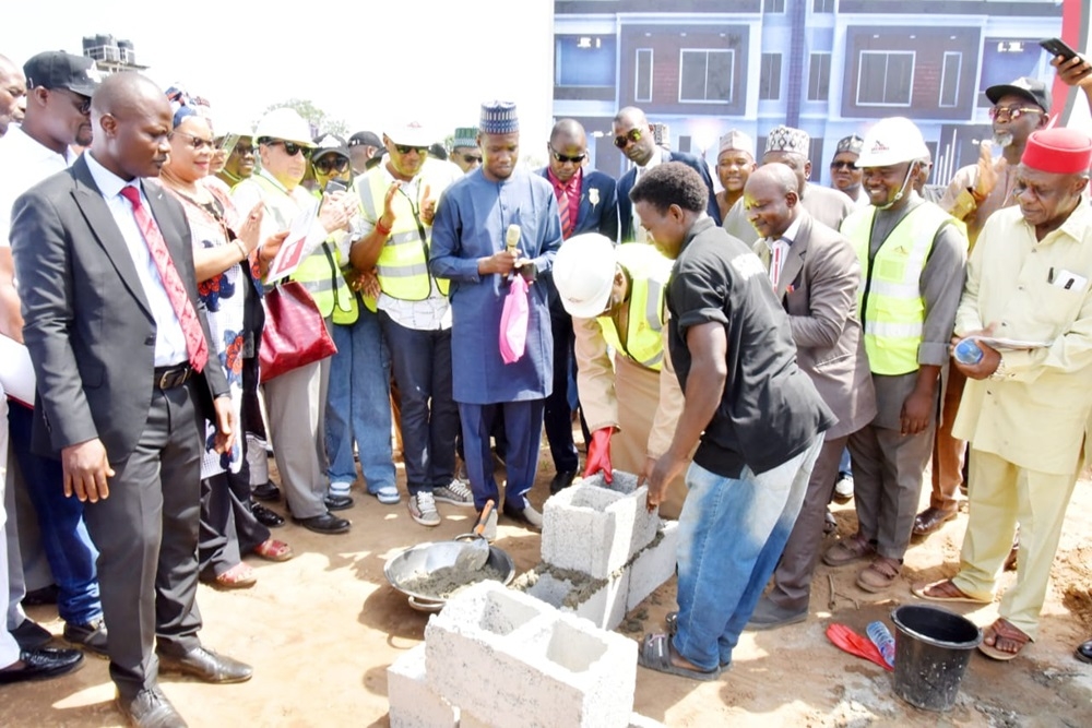 Honourable Minister of Housing and Urban Development, Arc. Ahmed Musa Dangiwa, performing the ground-breaking for a 480-housing unit project at the Kukwaba area of Abuja, on Thursday, 30 November 2023