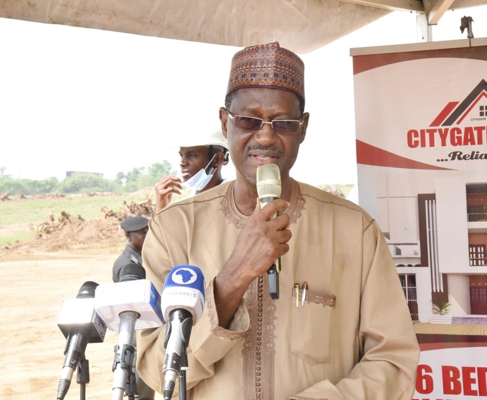 Honourable Minister of Housing and Urban Development, Arc. Ahmed Musa Dangiwa, performing the ground-breaking for a 480-housing unit project at the Kukwaba area of Abuja, on Thursday, 30 November 2023