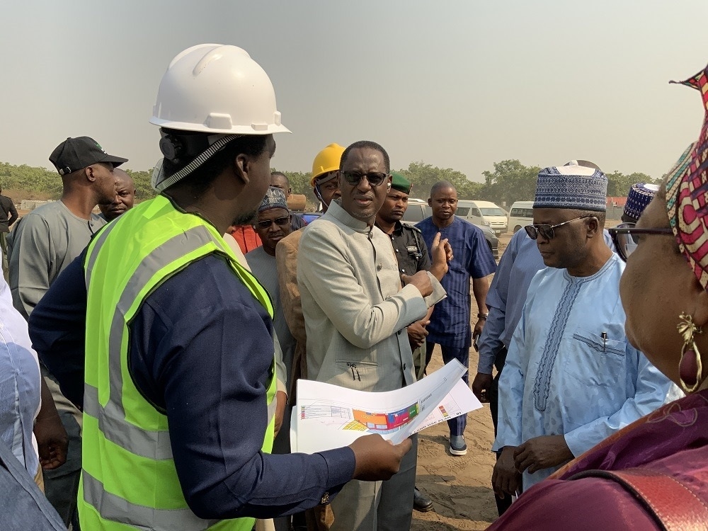 The Honourable Minister of Housing and Urban Development, Arch. Ahmed Musa Dangiwa, the Hon. Minister of State, Abdullahi Tijjani Gwarzo, Permanent Secretary, Dr. Marcus Ogunbiyi and Some Directors inspect work at the site for the proposed Renewed Hope City at Karsana Estate Phase 3, Abuja