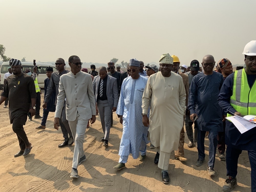 The Honourable Minister of Housing and Urban Development, Arch. Ahmed Musa Dangiwa, the Hon. Minister of State, Abdullahi Tijjani Gwarzo, Permanent Secretary, Dr. Marcus Ogunbiyi and Some Directors inspect work at the site for the proposed Renewed Hope City at Karsana Estate Phase 3, Abuja