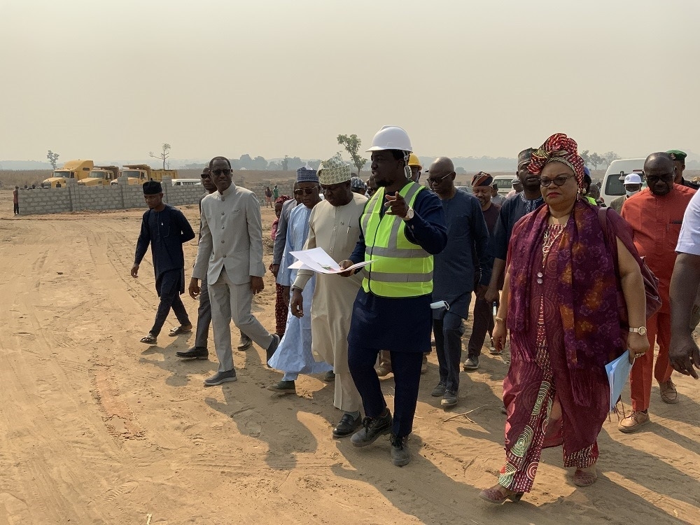 The Honourable Minister of Housing and Urban Development, Arch. Ahmed Musa Dangiwa, the Hon. Minister of State, Abdullahi Tijjani Gwarzo, Permanent Secretary, Dr. Marcus Ogunbiyi and Some Directors inspect work at the site for the proposed Renewed Hope City at Karsana Estate Phase 3, Abuja