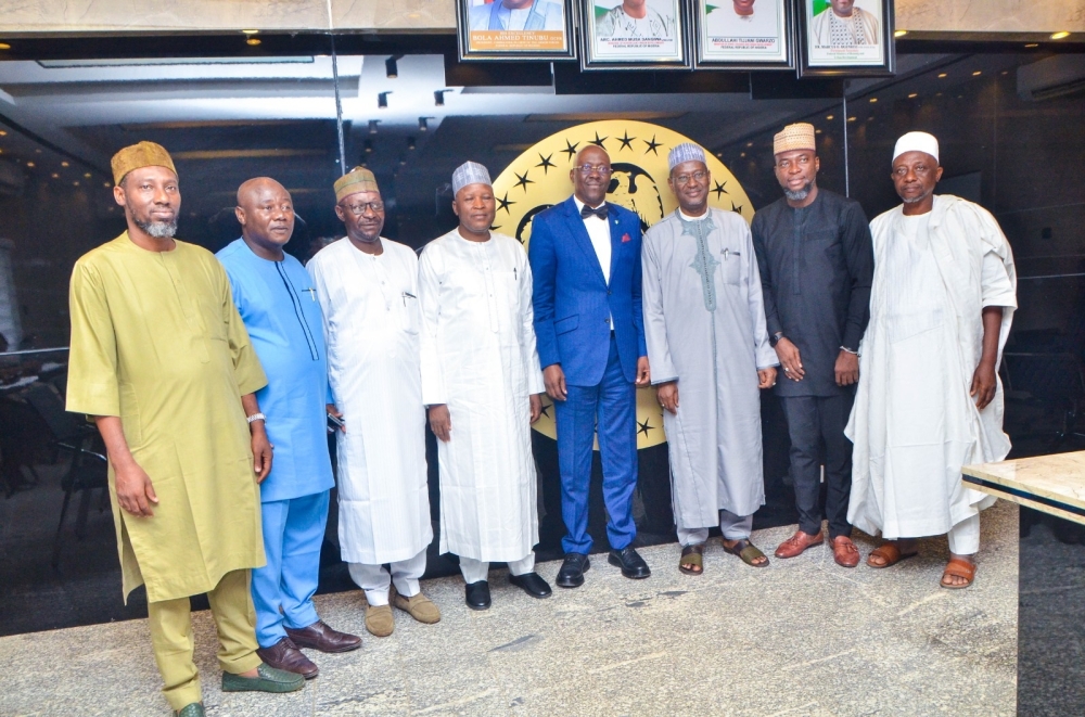 Minister and Minister of State, Housing and Urban Development , Arch Ahmed Dangiwa and Abdullahi Tijjani Gwarzo in a group photograph with the leadership of Real Estate Developers Association of Nigeria (REDAN) during their  visit to his office,  Thursday,  March 14th,  2024