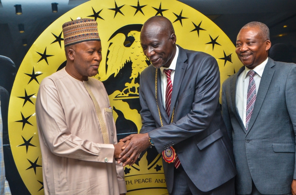 Hon. Minister of State Housing and Urban Development, Abdullahi Tijjani Gwarzo; receiving President, Nigeria Institute of Brokers and Lender; QS, Hayatuddeen  Auwal with members of his Delegations during a courtesy visits to the Ministry.