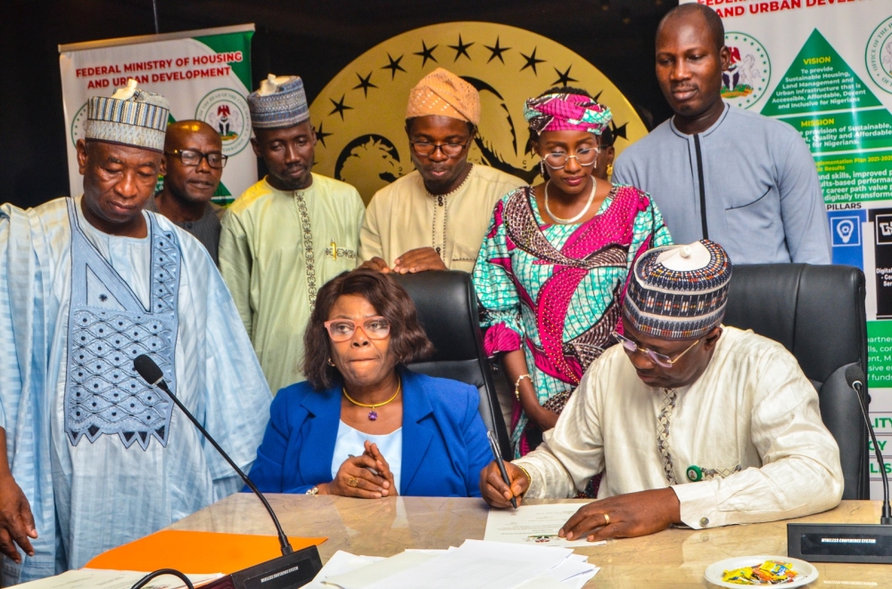 The Permanent Secretary,  Federal Ministry of Housing and Urban Development,  Dr. Marcus O. Ogunbiyi with Directors / Head of Units at the signing of the Performance Management Contract at the Ministry's Headquarter, Mabushi, Abuja on the 4th of July, 2024