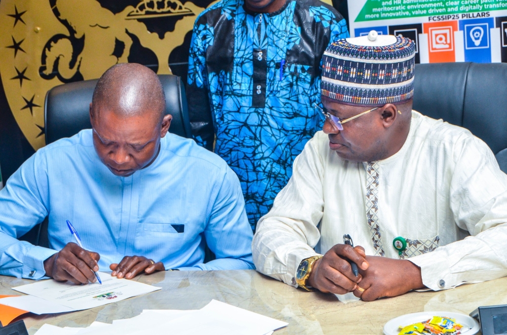 The Permanent Secretary,  Federal Ministry of Housing and Urban Development,  Dr. Marcus O. Ogunbiyi with Directors / Head of Units at the signing of the Performance Management Contract at the Ministry's Headquarter, Mabushi, Abuja on the 4th of July, 2024