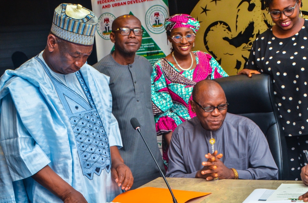 The Permanent Secretary,  Federal Ministry of Housing and Urban Development,  Dr. Marcus O. Ogunbiyi with Directors / Head of Units at the signing of the Performance Management Contract at the Ministry's Headquarter, Mabushi, Abuja on the 4th of July, 2024