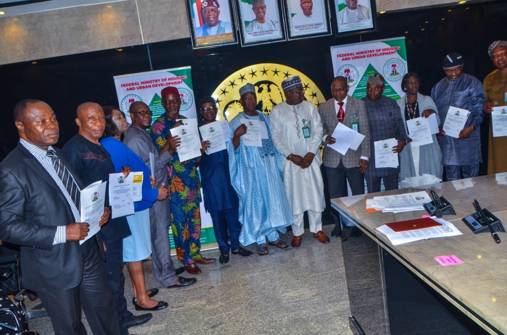 The Permanent Secretary,  Federal Ministry of Housing and Urban Development,  Dr. Marcus O. Ogunbiyi with Directors / Head of Units at the signing of the Performance Management Contract at the Ministry's Headquarter, Mabushi, Abuja on the 4th of July, 2024