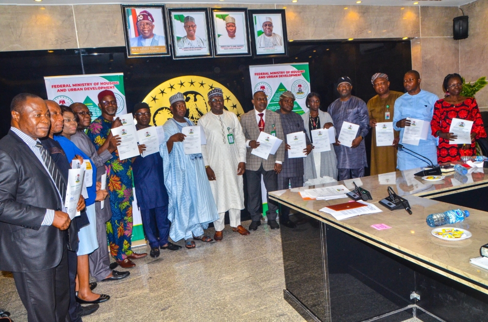 The Permanent Secretary,  Federal Ministry of Housing and Urban Development,  Dr. Marcus O. Ogunbiyi with Directors / Head of Units at the signing of the Performance Management Contract at the Ministry's Headquarter, Mabushi, Abuja on the 4th of July, 2024