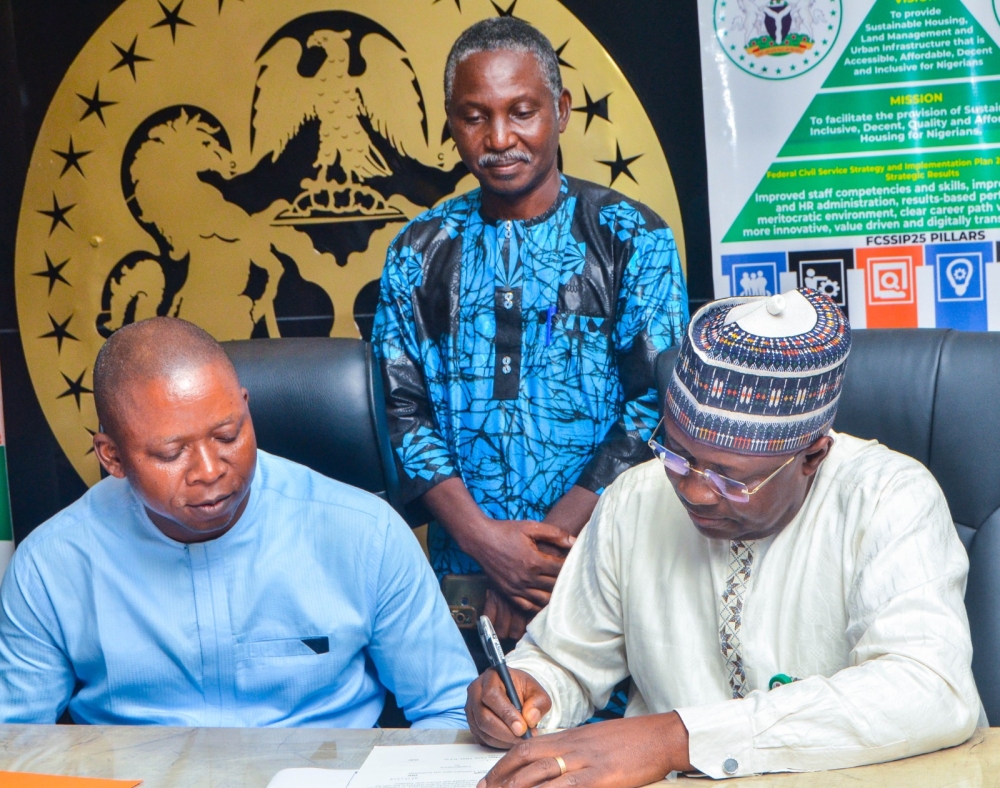 The Permanent Secretary,  Federal Ministry of Housing and Urban Development,  Dr. Marcus O. Ogunbiyi with Directors / Head of Units at the signing of the Performance Management Contract at the Ministry's Headquarter, Mabushi, Abuja on the 4th of July, 2024