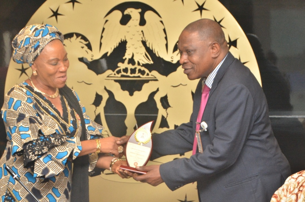 Presentation of award by the Hon Minister Arch. Ahmed Dangiwa, the Permanent Secretary Dr. Marcus Ogunbiyi and the National Servicom Coordinator at the Presidency to some Directors and  management staff of the Ministry in celebration of the 2024 Servicom Service Week at the Ministry's Conference Room, Mabushi, Abuja on the 7th October, 2024.