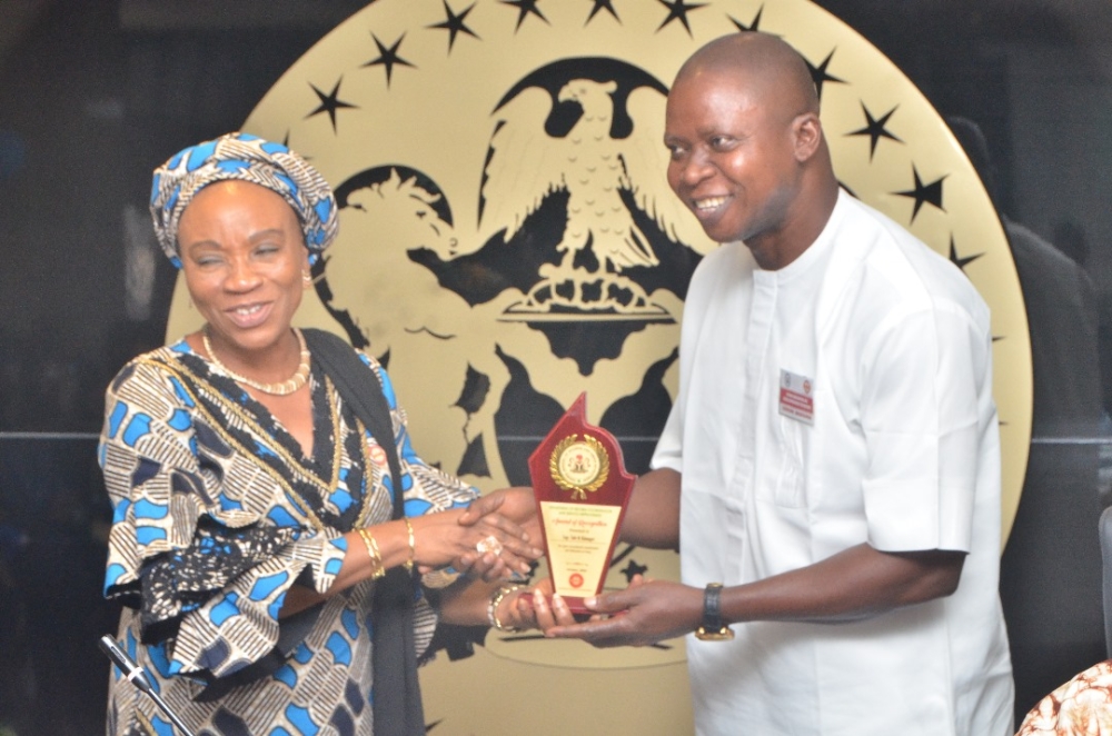 Presentation of award by the Hon Minister Arch. Ahmed Dangiwa, the Permanent Secretary Dr. Marcus Ogunbiyi and the National Servicom Coordinator at the Presidency to some Directors and  management staff of the Ministry in celebration of the 2024 Servicom Service Week at the Ministry's Conference Room, Mabushi, Abuja on the 7th October, 2024.