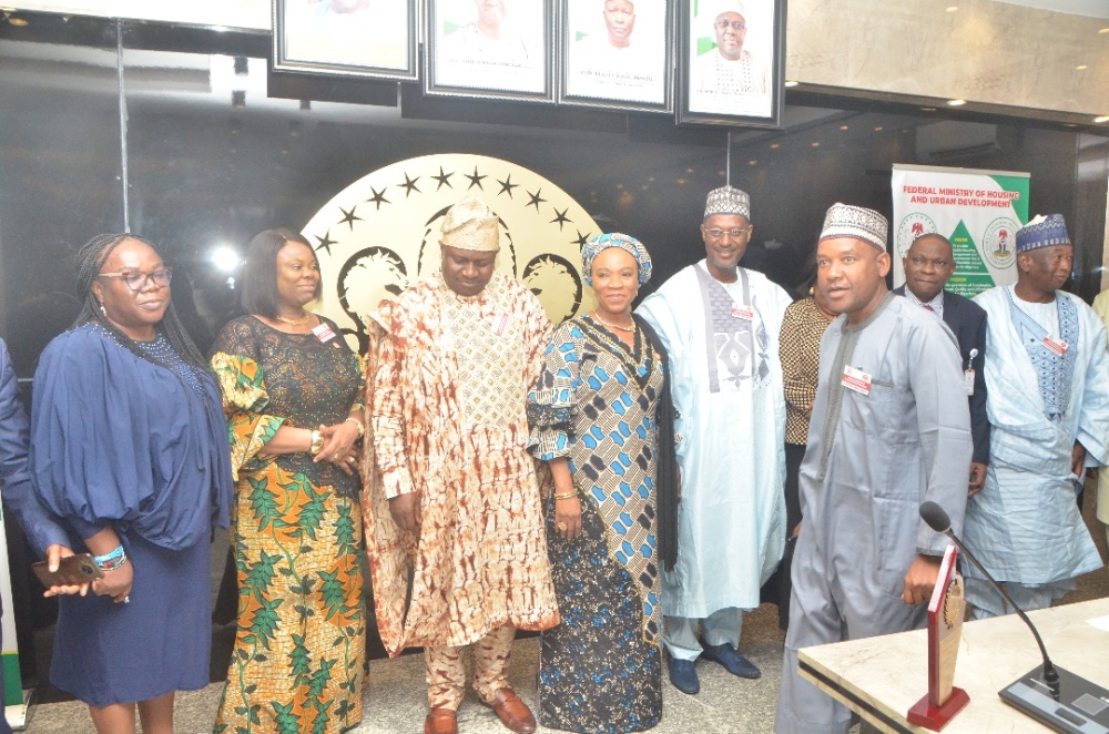 Presentation of award by the Hon Minister Arch. Ahmed Dangiwa, the Permanent Secretary Dr. Marcus Ogunbiyi and the National Servicom Coordinator at the Presidency to some Directors and  management staff of the Ministry in celebration of the 2024 Servicom Service Week at the Ministry's Conference Room, Mabushi, Abuja on the 7th October, 2024.