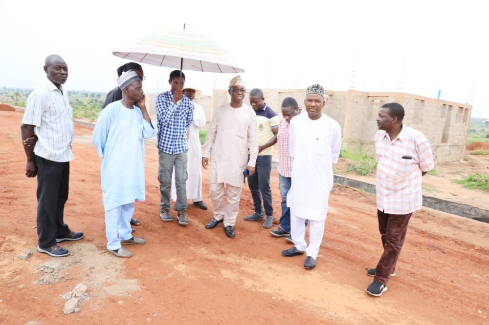 Inspection visit of Renewed Hope Housing Estate, Lafiya, Nassarawa State by the Director (Public Building & Housing Development), QS Pemi Temitope in company of the Director (Press & Public Relations),  Salisu Badamasi Haiba.