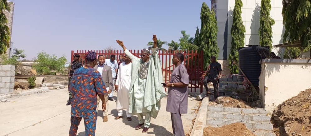 Photo Speak Minister of Housing and Urban Development, Arc. Ahmed Musa Dangiwa, accompanied by the Director  HOD Public Buildings and other officials, inspected the progress of work at the site of the new office complex today, December 31st, 2024, marking the final workday of the year