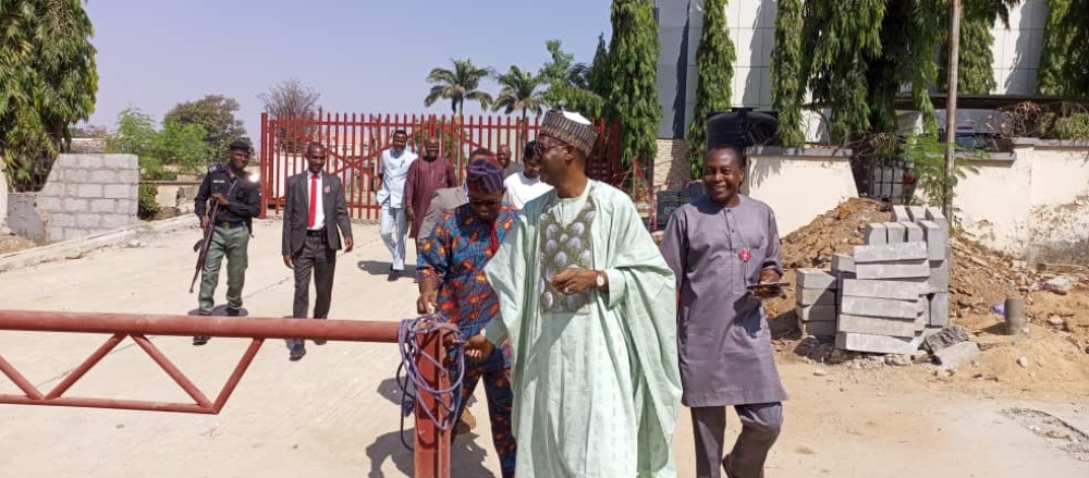 Photo Speak Minister of Housing and Urban Development, Arc. Ahmed Musa Dangiwa, accompanied by the Director  HOD Public Buildings and other officials, inspected the progress of work at the site of the new office complex today, December 31st, 2024, marking the final workday of the year