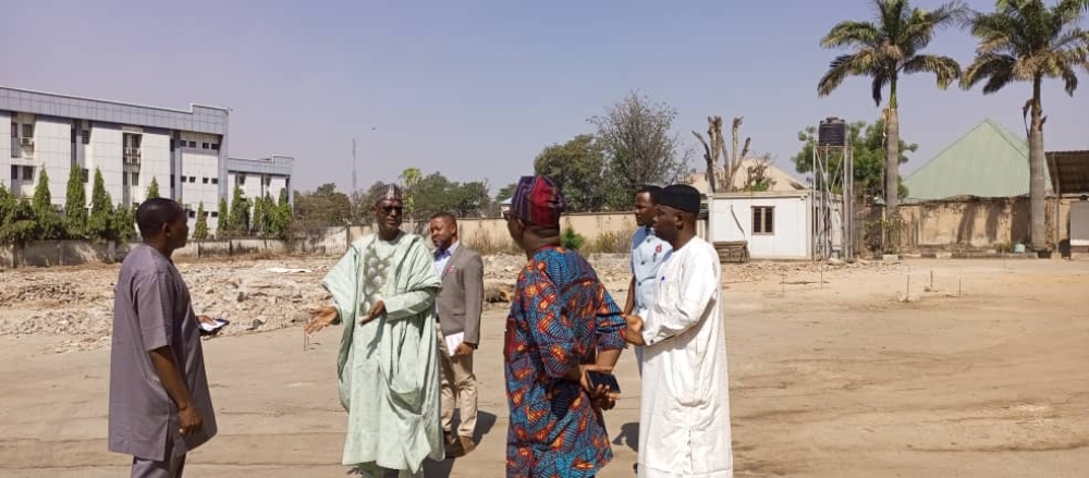 Photo Speak Minister of Housing and Urban Development, Arc. Ahmed Musa Dangiwa, accompanied by the Director  HOD Public Buildings and other officials, inspected the progress of work at the site of the new office complex today, December 31st, 2024, marking the final workday of the year