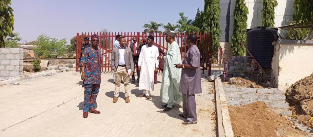 Photo Speak Minister of Housing and Urban Development, Arc. Ahmed Musa Dangiwa, accompanied by the Director  HOD Public Buildings and other officials, inspected the progress of work at the site of the new office complex today, December 31st, 2024, marking the final workday of the year