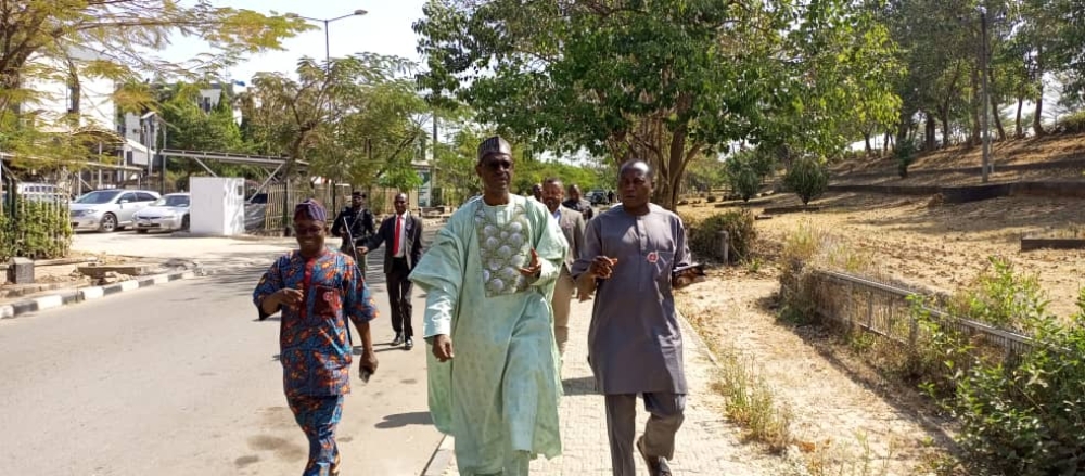 Photo Speak Minister of Housing and Urban Development, Arc. Ahmed Musa Dangiwa, accompanied by the Director  HOD Public Buildings and other officials, inspected the progress of work at the site of the new office complex today, December 31st, 2024, marking the final workday of the year