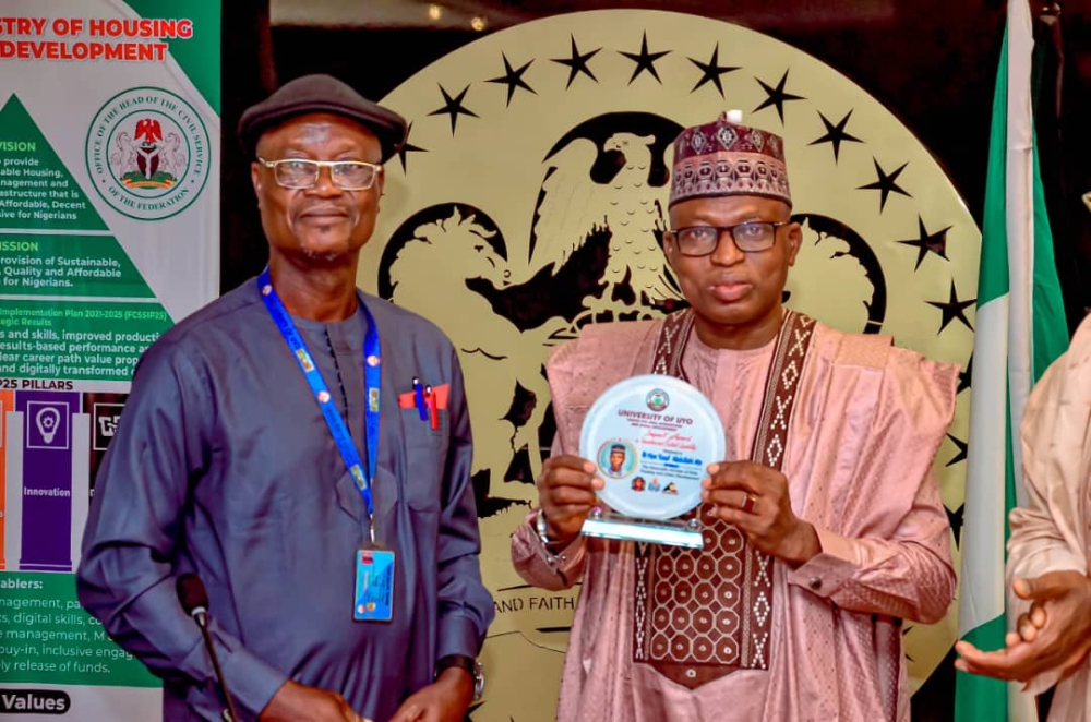 Hon Minister of State,  Rt Hon Abdullahi Ata and Permanent Secretary, Dr Shuaib Belgore in a meeting with the delegation from the University of Uyo, Center for Skills Acquistion and Rural Development at the Conference room of the Ministry,  Mabushi,  Abuja