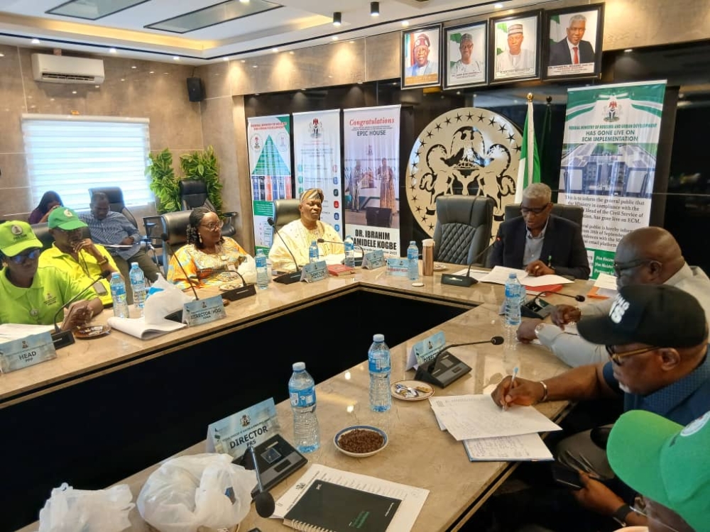 Permanent Secretary, FMHUD, Dr Shuaib Belgore presided over the Ministry’s Top Management Meeting and Launched the PMS Jackets for the Ministry,  Thursday,  9th October, 2025