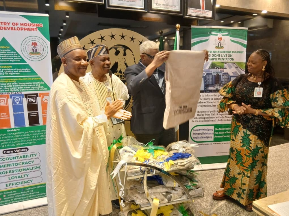 Permanent Secretary, FMHUD, Dr Shuaib Belgore presided over the Ministry’s Top Management Meeting and Launched the PMS Jackets for the Ministry,  Thursday,  9th October, 2025