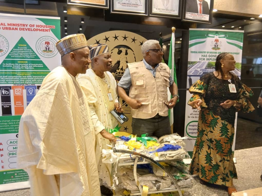 Permanent Secretary, FMHUD, Dr Shuaib Belgore presided over the Ministry’s Top Management Meeting and Launched the PMS Jackets for the Ministry,  Thursday,  9th October, 2025