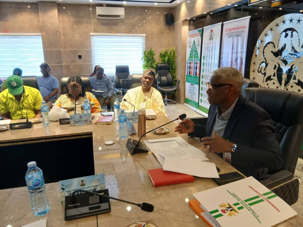 Permanent Secretary, FMHUD, Dr Shuaib Belgore presided over the Ministry’s Top Management Meeting and Launched the PMS Jackets for the Ministry,  Thursday,  9th October, 2025